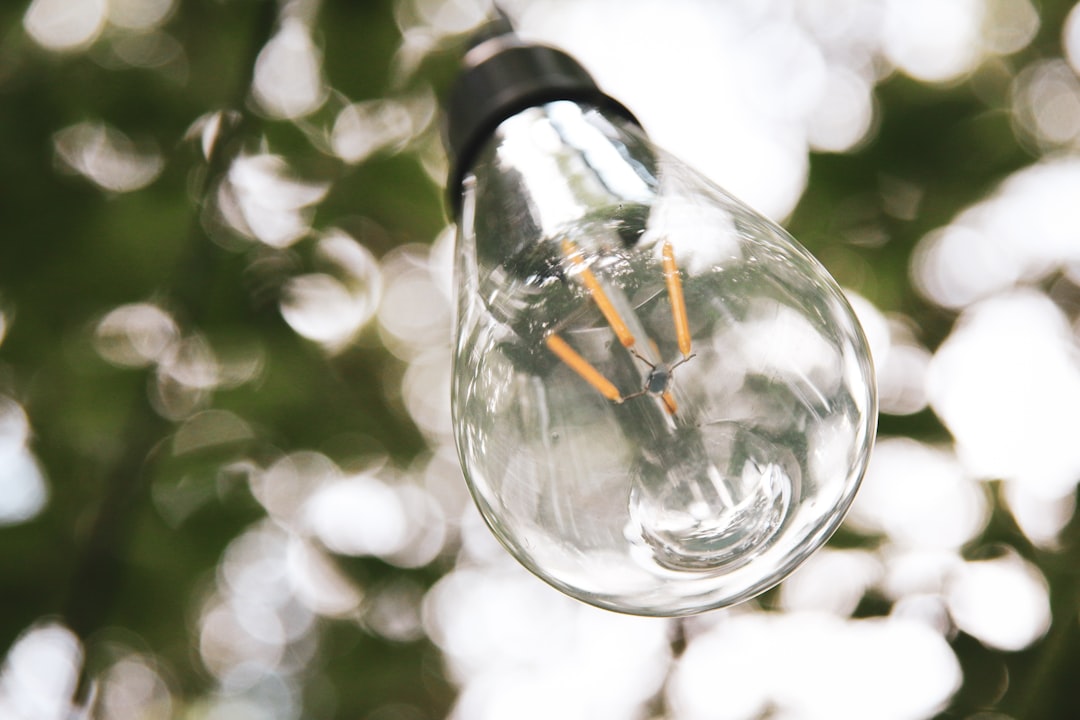 clear glass bottle with water